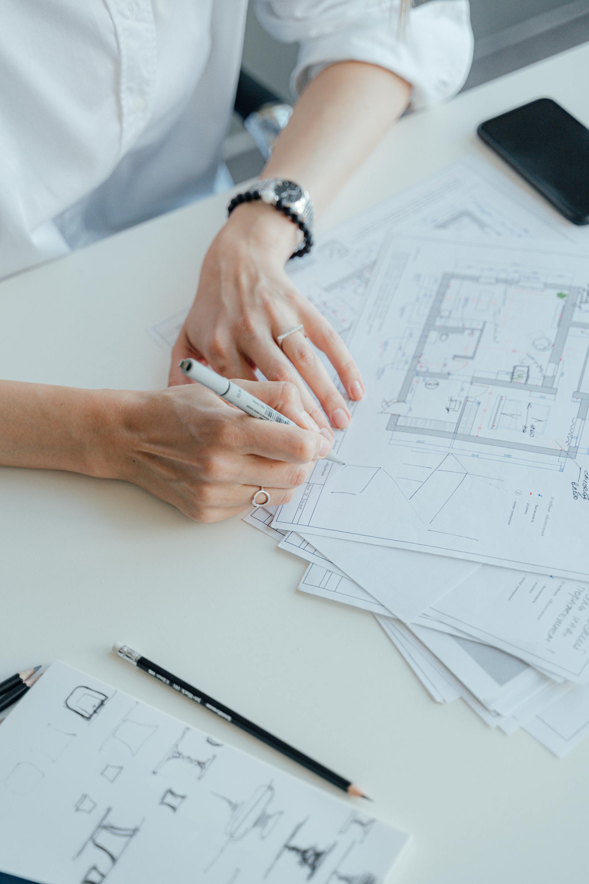 Construction drawings being marked up during design